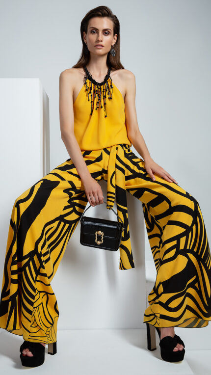 Abito tutone maestri haute couture giallo e nero pantalone a palazzo collo gioiello