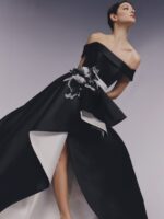 Pronovias The Party Collection abito nero con riporti bianchi rigido molto elegante scollo omerale cintino con fiore a lato decorativo - immagine 3